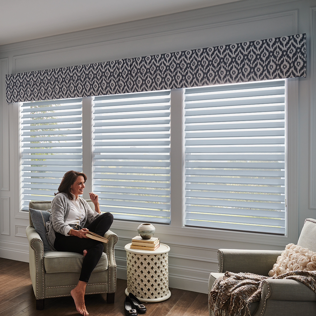 Sheer Shadings in a Bedroom with Woman Reading