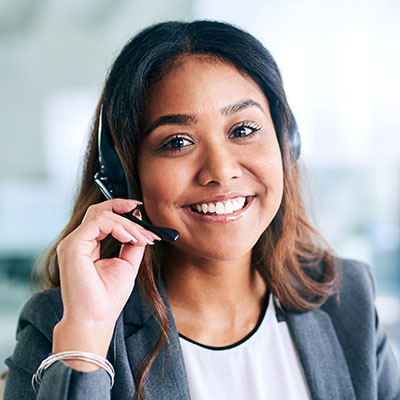 Photo of Woman on a Headset in Customer Service